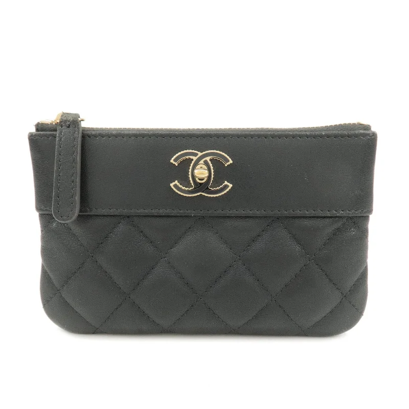 Chanel Vintage Inspired Handbag for Retro LoversCHANEL Matelasse Lamb Skin Coco Mark Pouch Black Gold