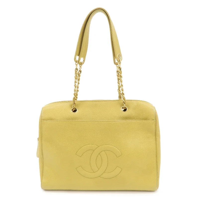 Chanel bags available at online luxury retaileCHANEL Caviar Skin Coco Mark Chain Tote Bag Mustard Gold HDW