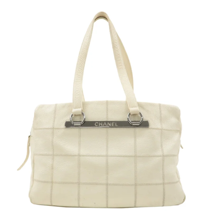 Chanel bags with exclusive seasonal releasesCHANEL Chocolate Bar Caviar Skin Tote Bag Hand Bag White