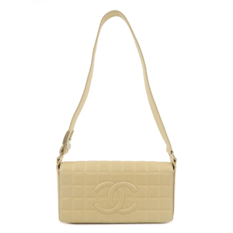 Chanel bags with iconic gold chainsCHANEL Chocolate Bar Lamb Skin Shoulder Bag Beige