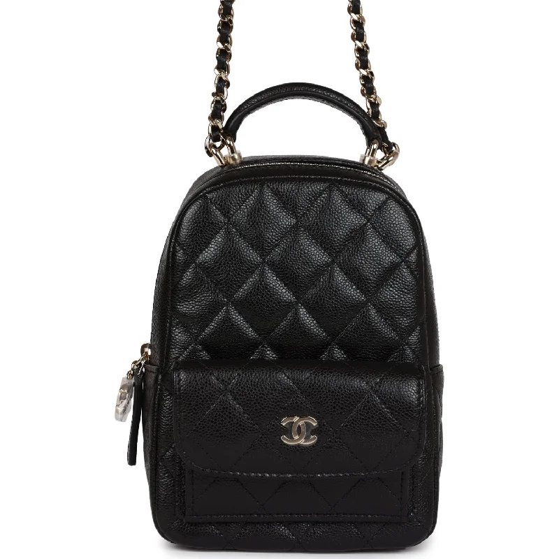 Chanel bags with gold, silver, and pearl accentsChanel Mini Phone Holder Backpack Black Caviar Light Gold Hardware