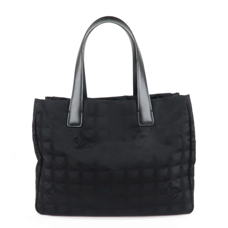 Chanel bags with iconic stitching detailsCHANEL New Travel Line Nylon Jacquard Leather Tote MM Black A15991