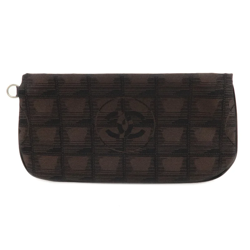 Chanel Limited Edition Handbag for CollectorsCHANEL New Travel Line Nylon Jacquard Pouch Dark Brown