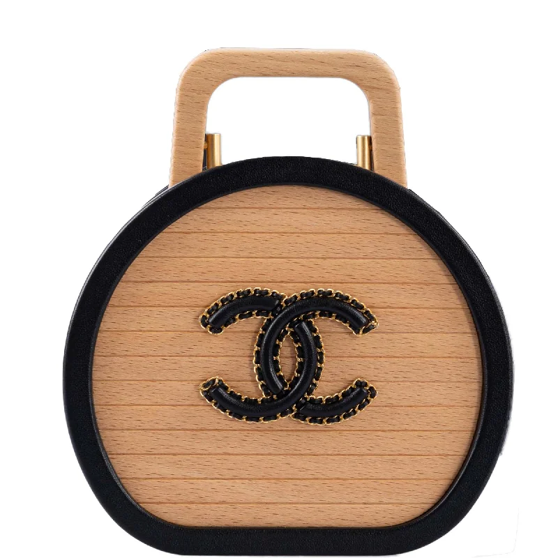 Chanel bags for women who appreciate fine craftsmanshipChanel Round CC Vanity Case Beechwood and Black Lambskin Gold Hardware