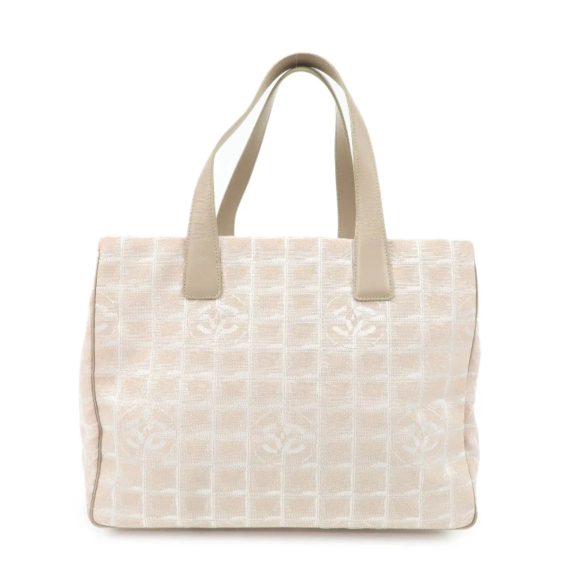 Chanel bags available at online luxury retaileCHANEL Travel Line Nylon Jacquard Leather Tote Bag Beige A15991