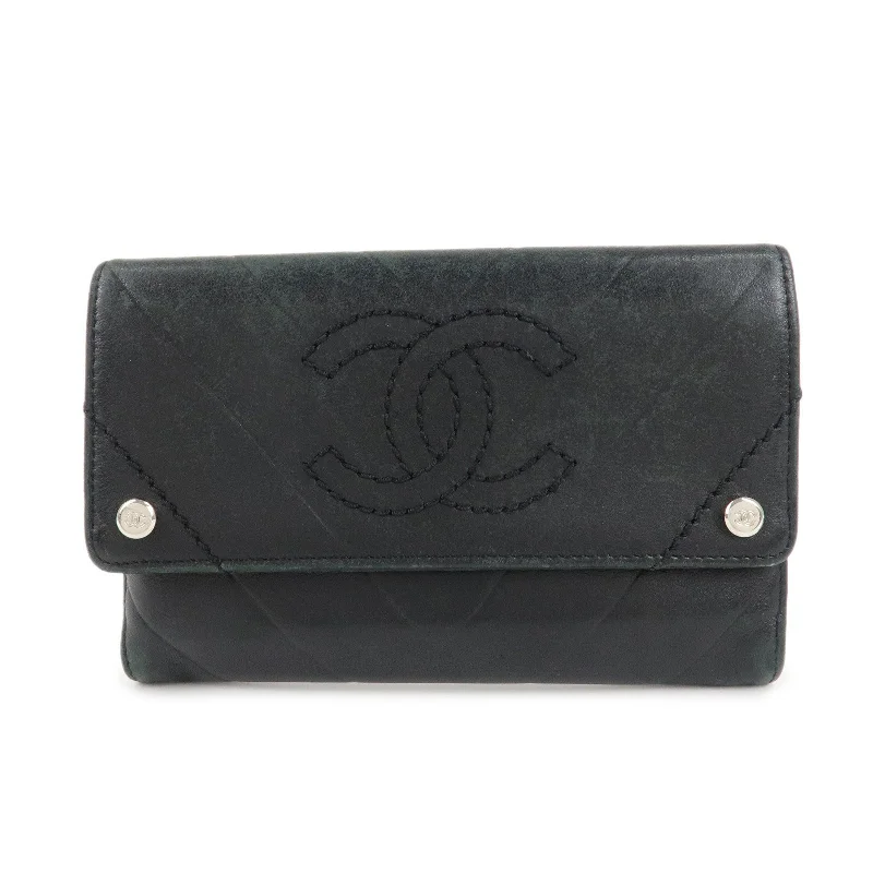 Chanel bags available in bold colors and patternsCHANEL V Stitch Lamb Skin Coco Mark Bi-fold Wallet Black