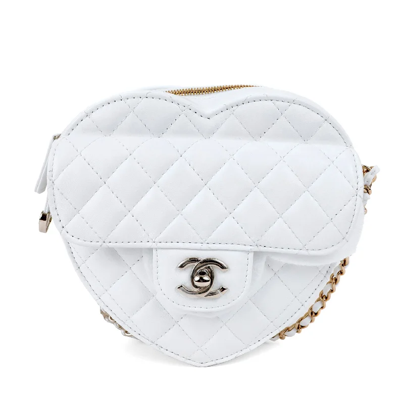 Chanel bags for women with minimalist styleChanel White Lambskin Mini Heart Bag with Gold Hardware