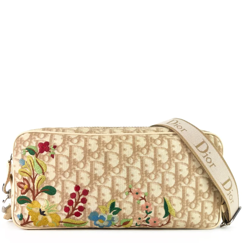 Christian Dior Saddle bags with a distressed leather finishFlowers Monogram Canvas Embroidered Bag