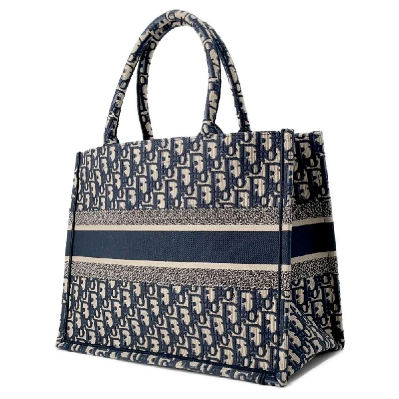 Christian Dior handbags with a snap - button closure and a decorative buckleDior Oblique Book Tote Navy M1296ZRIW Canvas Size Medium