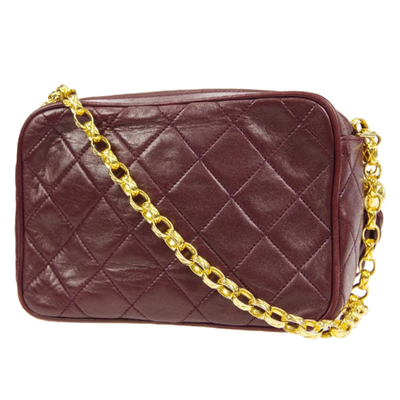 Chanel bags in luxury boutiques worldwideCHANEL 1991-1994 Pocket Camera Bag Mini Bordeaux Lambskin 87986