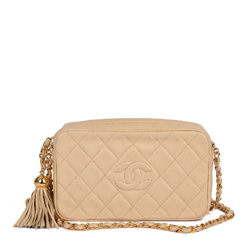 Chanel bags with iconic stitching detailsChanel Beige Quilted Lambskin Vintage Small Fringe Timeless Camera Bag