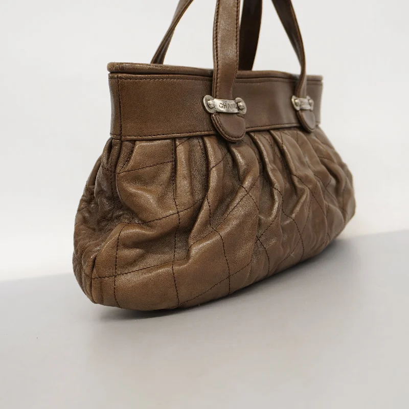 Chanel bags available at online luxury retaileCHANEL   Matelasse Handbag Women's Leather Handbag Brown