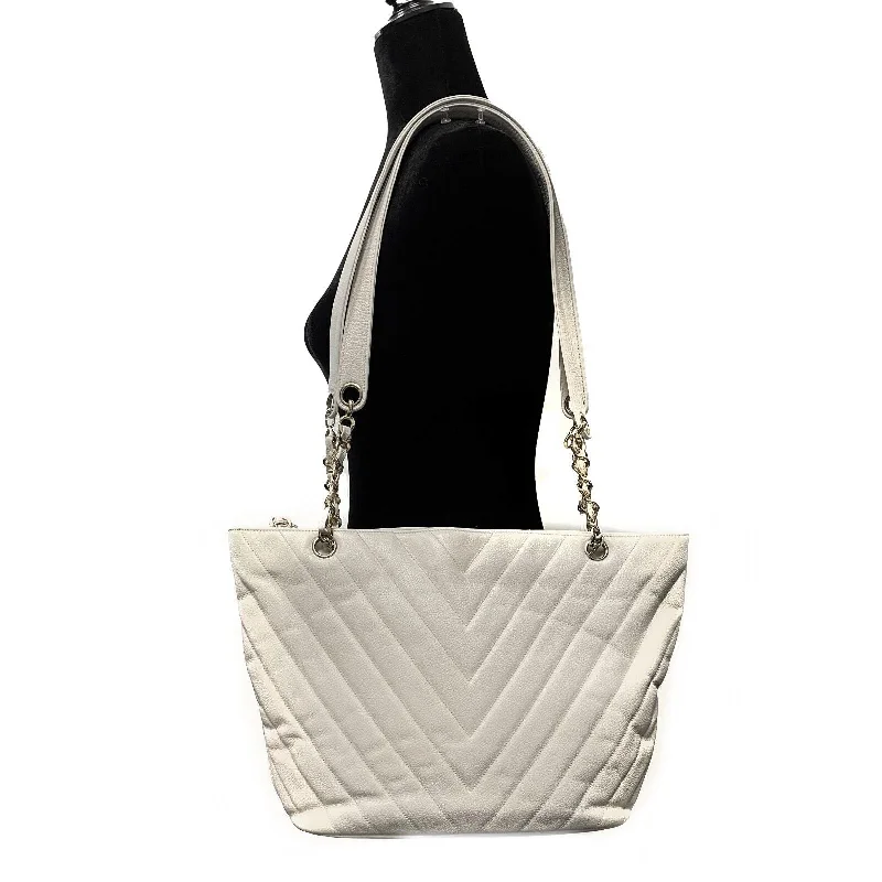 Chanel bags available at online luxury retaileCHANEL - Vintage 1994 White Leather Small Chevron Tote / Shoulder Bag