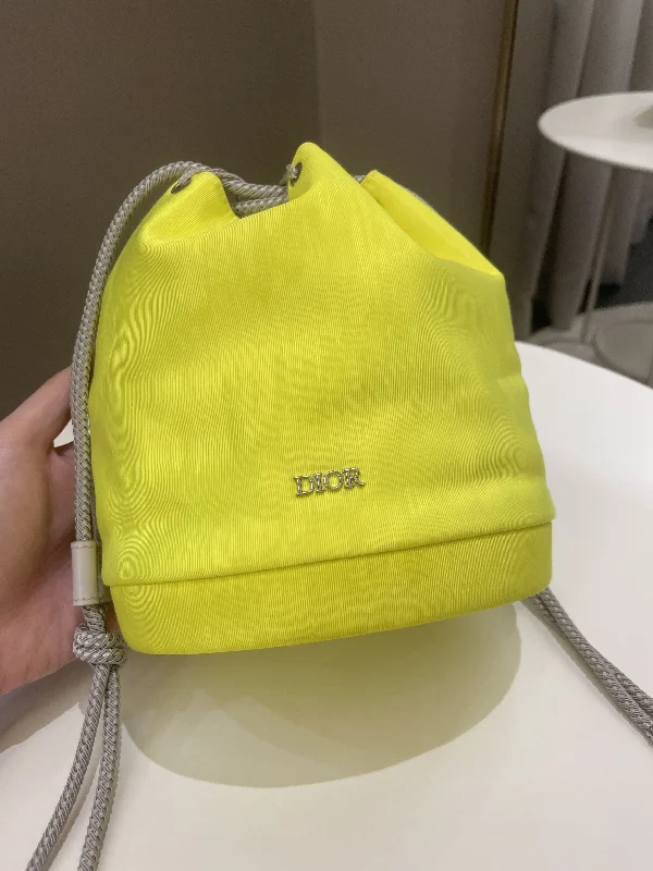 Christian Dior bags with a side - pocket for holding a water bottleDior Mini Marine Bucket Bag Yellow Canvas/ Lambskin