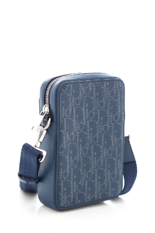 Christian Dior handbags with a snap - button closure and a decorative buckleDior Navy Calfskin Perforated Cross-Body