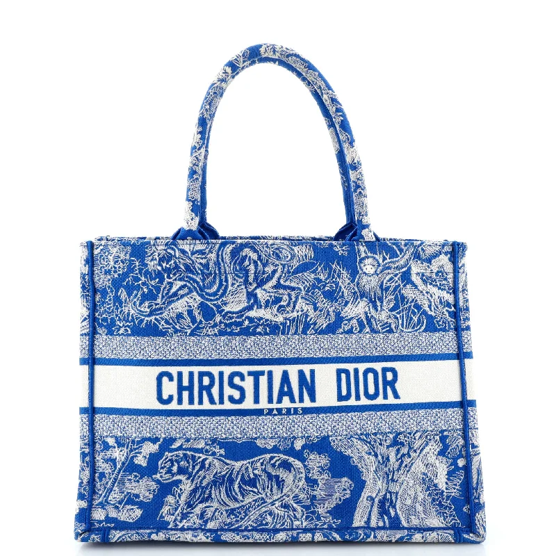 Christian Dior handbags with a snap - button closure and a decorative buckleBook Tote Embroidered Canvas Medium