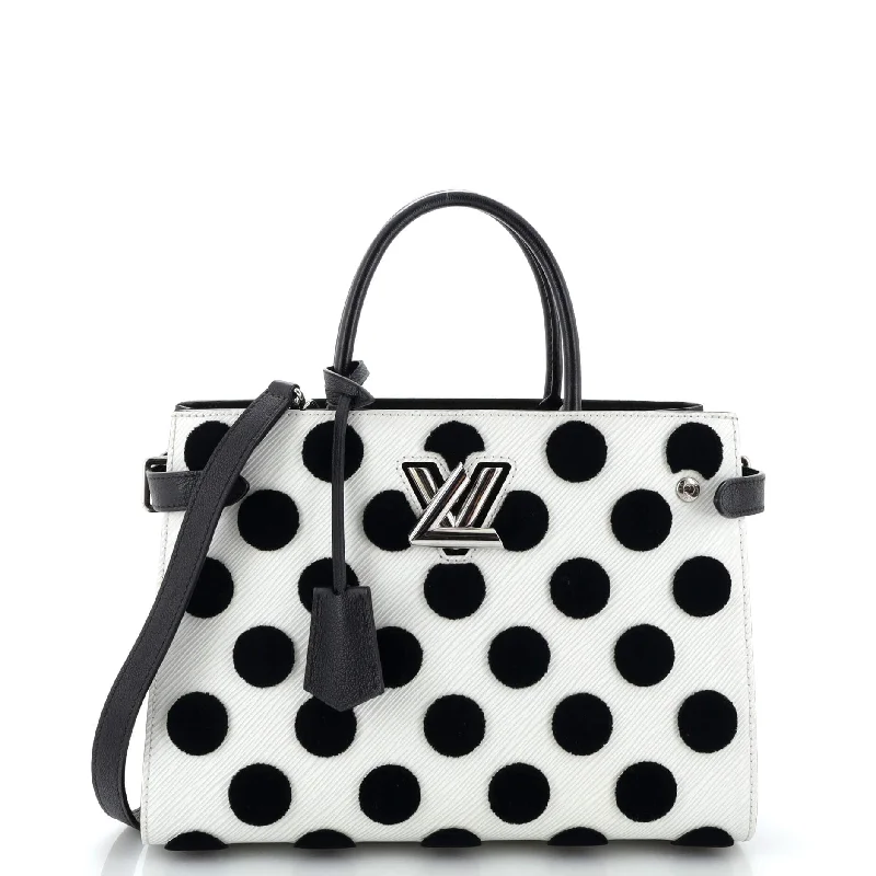 Christian Dior tote bags with a printed Dior logo on the frontTwist Tote Limited Edition Polka Dots Epi Leather