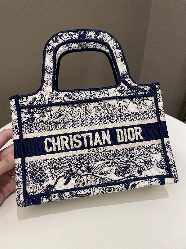 Christian Dior bags with a detachable coin purse insideDior Mini Book Tote Blue